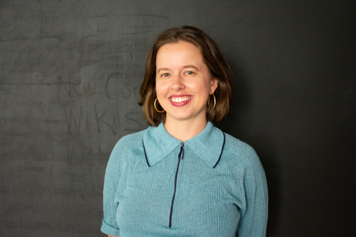 Carolyn Cesarotti wearing a light blue shirt smiling at the camera.